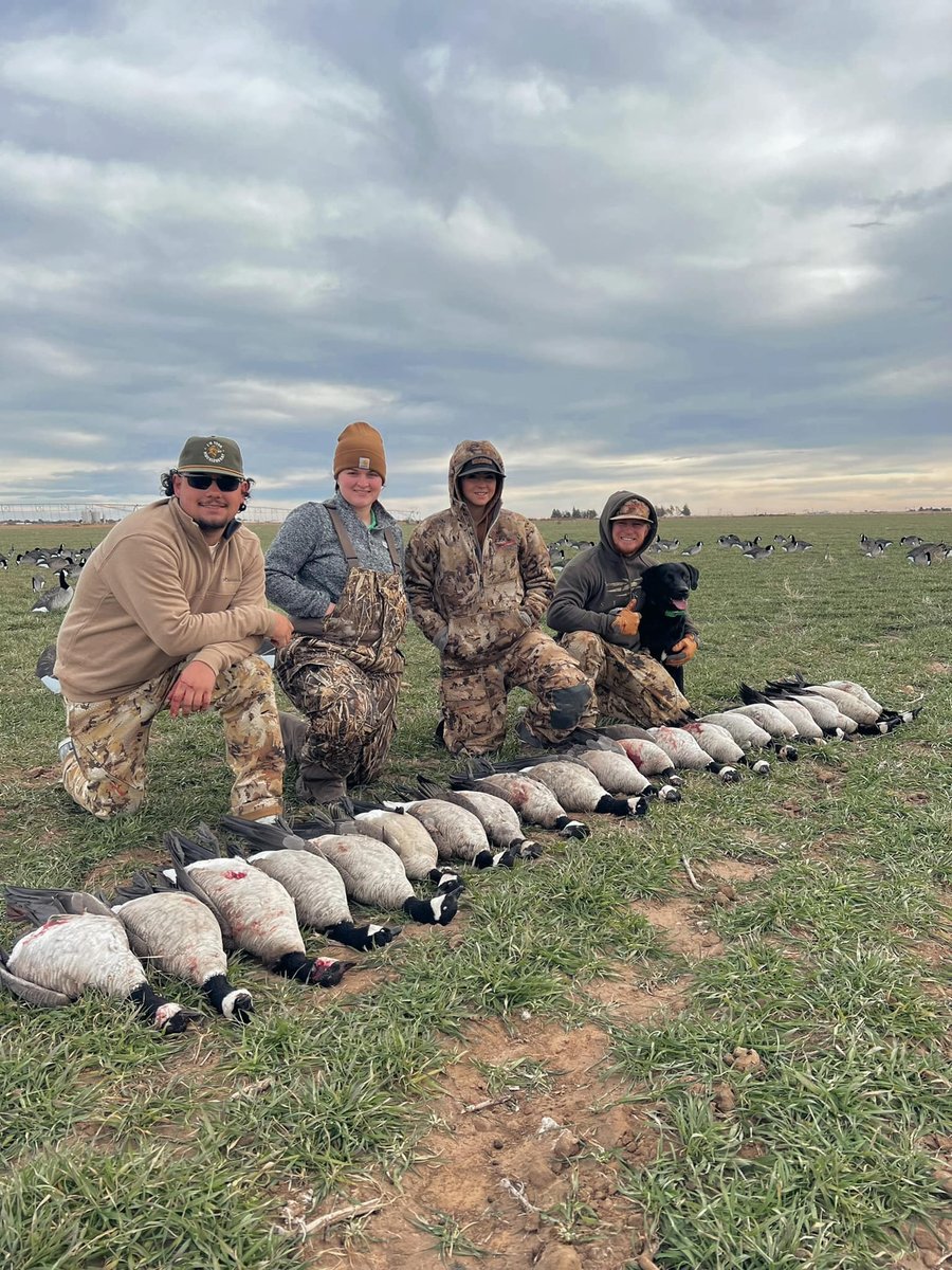Group of hunters in Lubbock, TX with hunting dog 