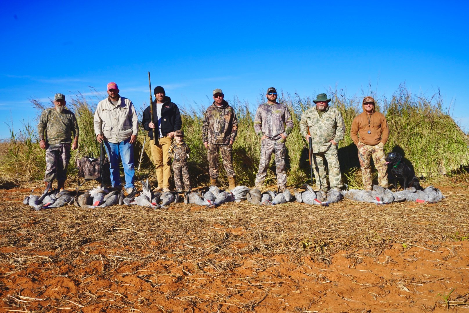 Six male hunters and one kid hunter 