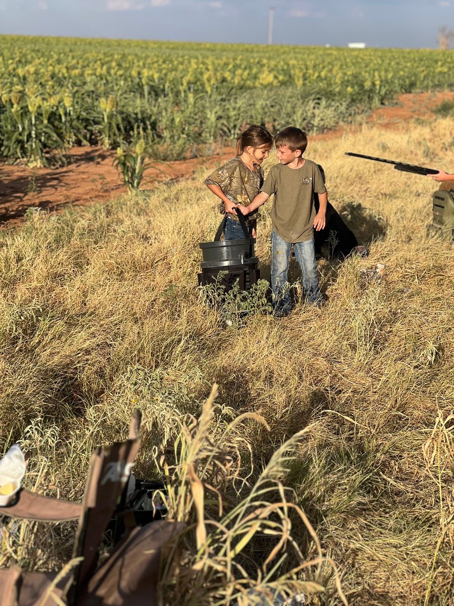 Boy and girl hunters in Lubbock, TX fields